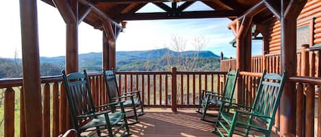 Savor the vistas - The cabin’s spacious gazebo has both a porch swing and rockers. All are delightful bucolic places to kick back and revel in the views of the Great Smoky Mountains.