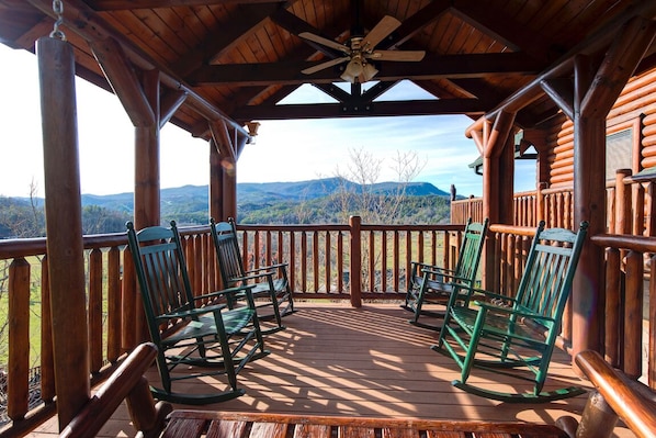 Savor the vistas - The cabin’s spacious gazebo has both a porch swing and rockers. All are delightful bucolic places to kick back and revel in the views of the Great Smoky Mountains.