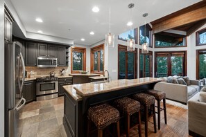 Open Layout with Bar Seating for 4 in the Fully Equipped Kitchen