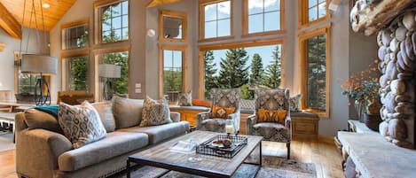 Living Area with Gas Fireplace, 65" HD TV and DVD with Surround Sound
