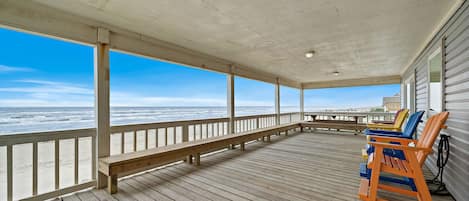 Enjoy the stunning beach vista from this incredible patio