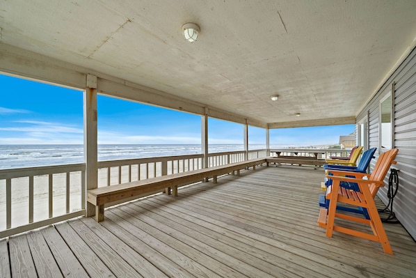 Enjoy the stunning beach vista from this incredible patio