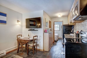 Kitchen - New tile flooring throughout the unit