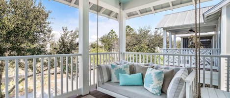 Ahhhh...that is the sound of you relaxing in the daybed swing on the covered balcony.