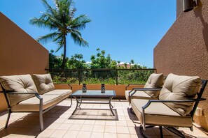 Relax and enjoy morning coffee from your private lanai