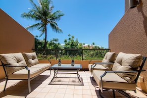 Relax and enjoy morning coffee from your private lanai