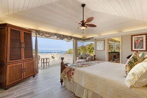 Primary bedroom with King bed & ocean views