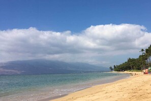 Waiohuli Beach Hale is situated on a white sandy beach.