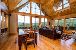 The dining area adjoins the kitchen, and includes a table that will seat eight comfortably.