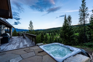 Relax amongst beautiful views in the hot tub.
