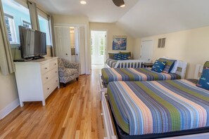 Second Level | Bedroom 2 | 1 Queen | 3 Twin | Attached 3/4 Bath