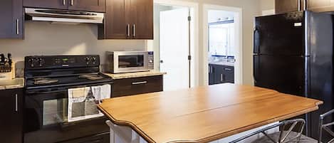 A bright and well organized kitchen.