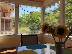 Porch - Enjoy time with your family on this grand wrap around screened in porch. Great for dining or just sitting back and relaxing.