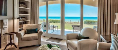 Adagio A102 living room view - Spacious living area with easy access to patio overlooking the Gulf of Mexico.