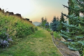 Park City Woodside Ski Estate - Ski-in/out access to Quit'n Time ski run is adjacent to the back deck.