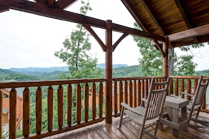 Picture-perfect - From the deck’s wooden chairs you can gaze out over the treetops toward the Smoky Mountains, reveling in the crisp breeze as songbirds provide the perfect background music.