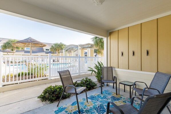 Enjoy your private patio with a beautiful view of the pool