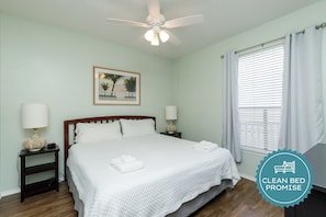 Master bedroom with king size bed and flat screen TV