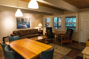 Living/dining/ kitchen - Living room with TV, wood burning Fireplace and more amenities.