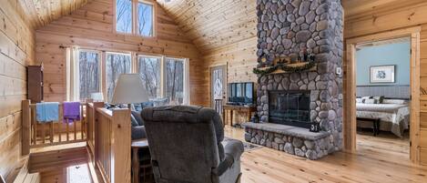 Main Level Great Room w/ Gas Fireplace & Deck Access