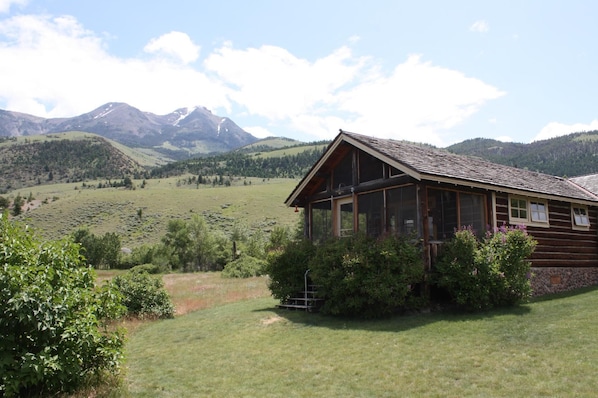 Charming, rustic cabins on the edge of the rugged Absaroka Mountain Range. The main cabin can accommodate up to four guests.