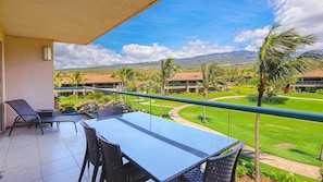 Watch the sunrise over the mountains from this covered lanai