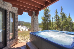Outdoor - Relax on the lower level back patio with private hot tub. - Charter Ridge 60 Breckenridge Vacation Rental