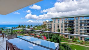 Clear glass balcony railing for unobstructed views of the pool & ocean