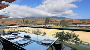 Outdoor dinner with a view of the West Maui Mountains