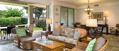 Relax in your spacious living room or on the lanai..