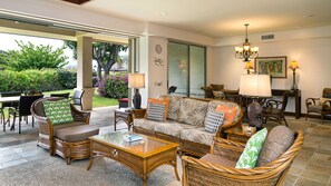 Relax in your spacious living room or on the lanai..