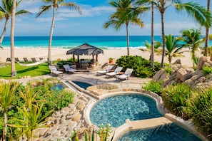 Gorgeous patio with pool and beachfront