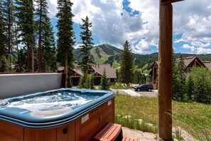 Melt your worries away in the private hot tub at Lakota 106