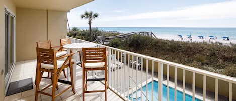 Large balcony overlooking pool