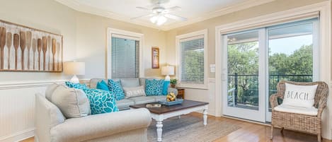 Brass Rail 317 Open Living area with sleeper sofa and flat screen TV