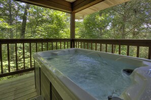 Enjoy the hot tub in secluded privacy surrounded by nature.