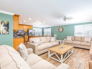 Living Area with 2 Sleeper Sofas and TV