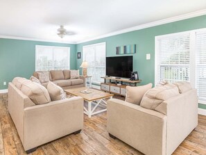 Living Area with 2 Sleeper Sofas and TV