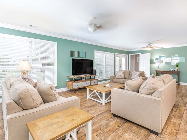 Living Area with 2 Sleeper Sofas and TV