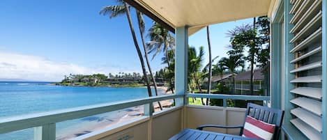 This second story condo has a lanai overlooking Napili Bay Beach