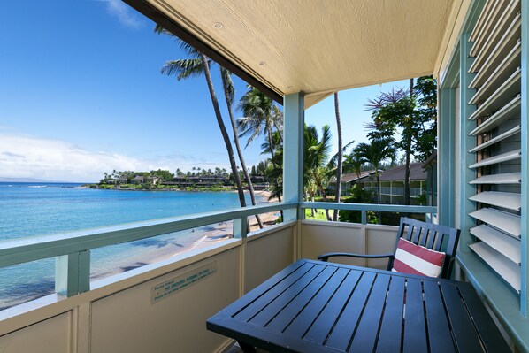 This second story condo has a lanai overlooking Napili Bay Beach