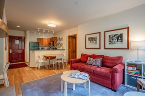 Settle into this colorful living room that has a Queen Sofa Pullout.