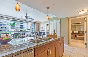 With stainless steel appliances, granite counters, and a professional Vitamix blender
                