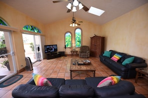 Living Room - Large living room with satellite television.