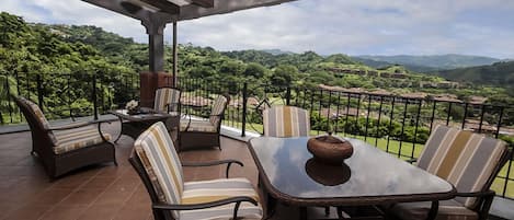 Terrace with Amazing View of the Golf Course and Rainforest. You can even see Macaws fly by.