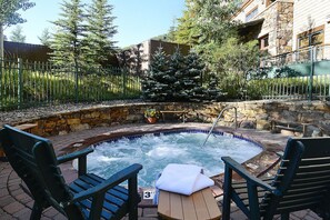 Relax in one of the bubbling hot tubs at Zephyr Mountain Lodge
