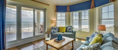 Lovely Living Room with Sleeper Sofa and Balcony Access