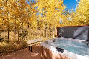 Enjoy a private hot tub wrapped in nature