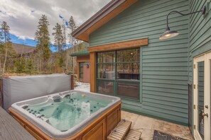 The patio features a private hot tub.