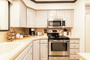Fully Equipped Kitchen with Stainless Steel Appliances